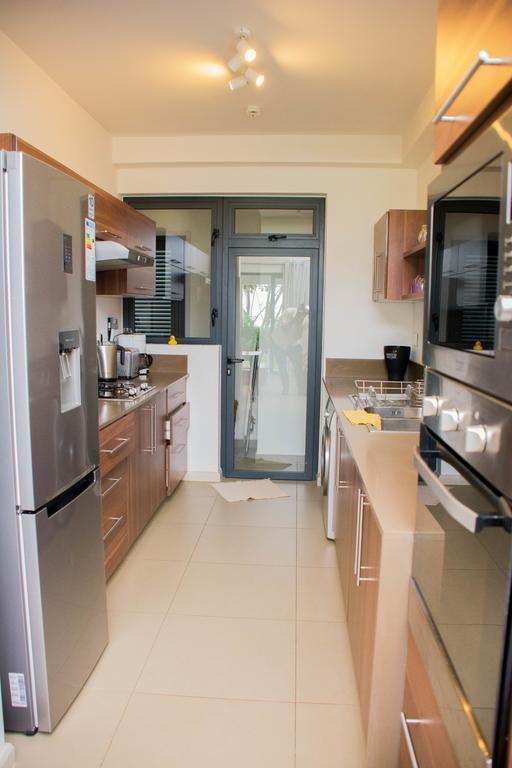 Apartment Azuri Roches Noires Exterior foto